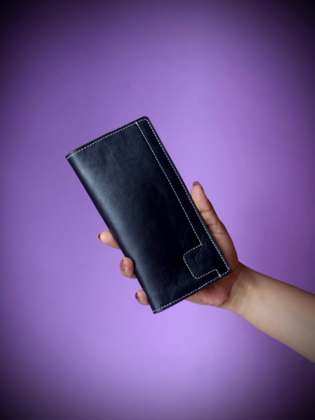 Raw texture genuine cow leather long wallet black - front view with white contrast stitching