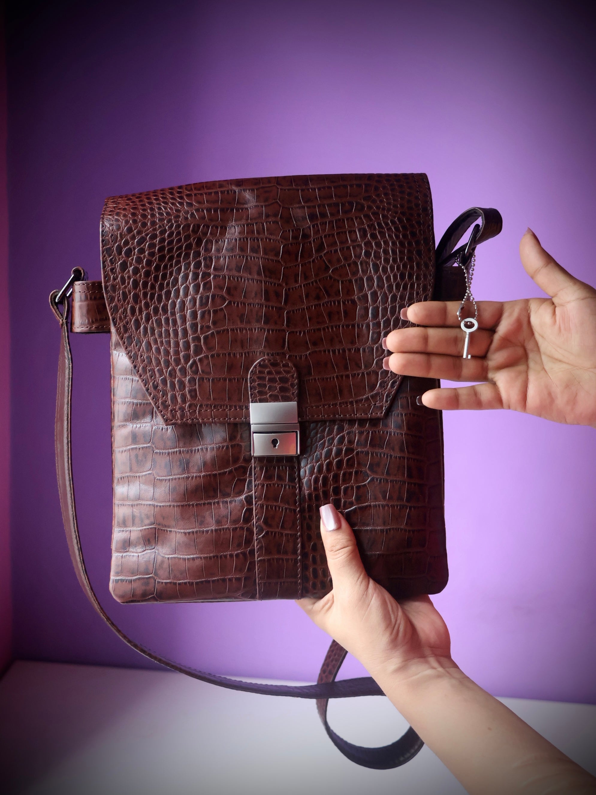 Croco embossed leather messenger satchel bag dark brown - back view showing front zipper pocket and crossbody strap
