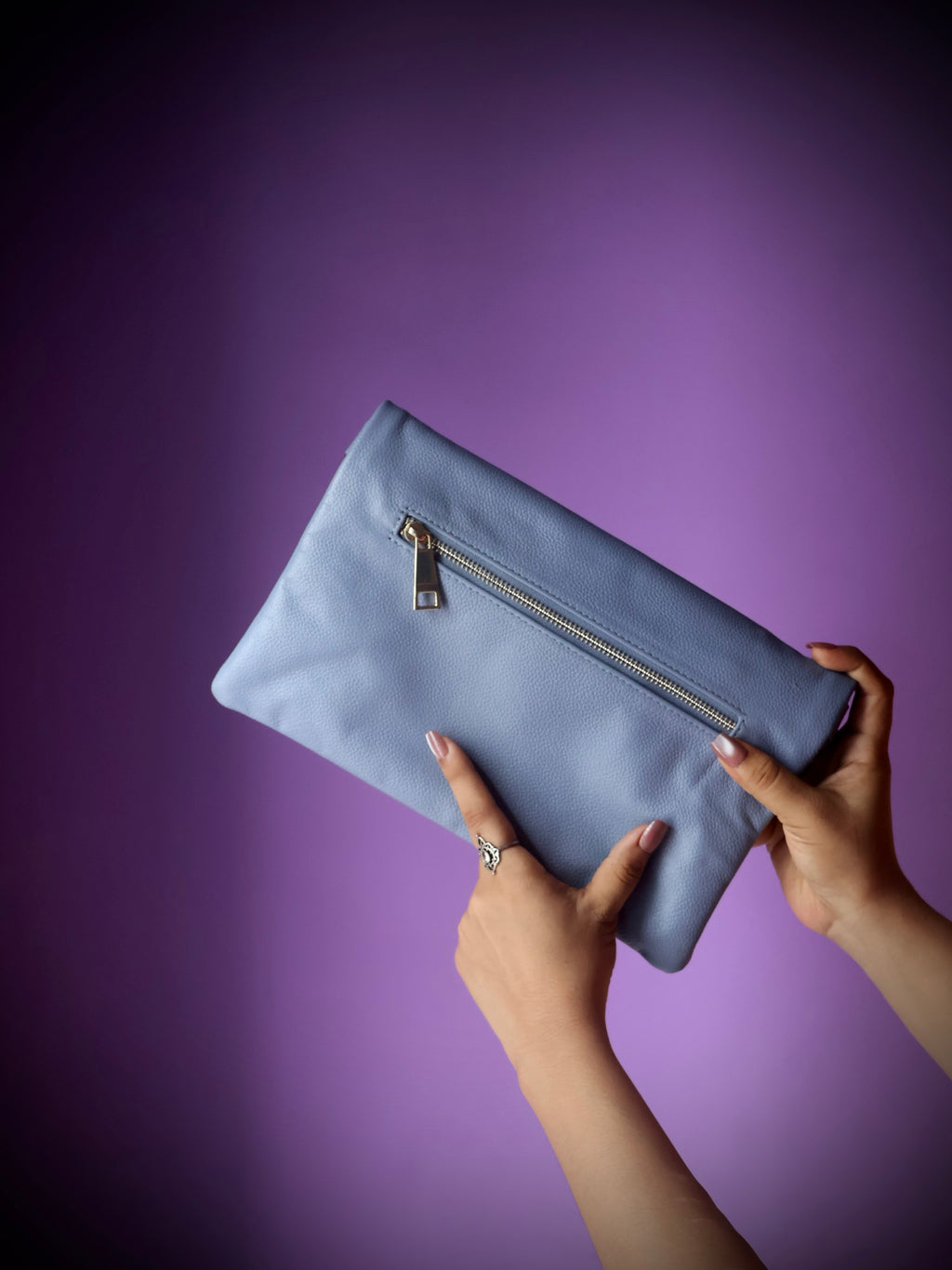 Original leather crossbody clutch bag sky blue - back view showing snap button closure and multiple pockets