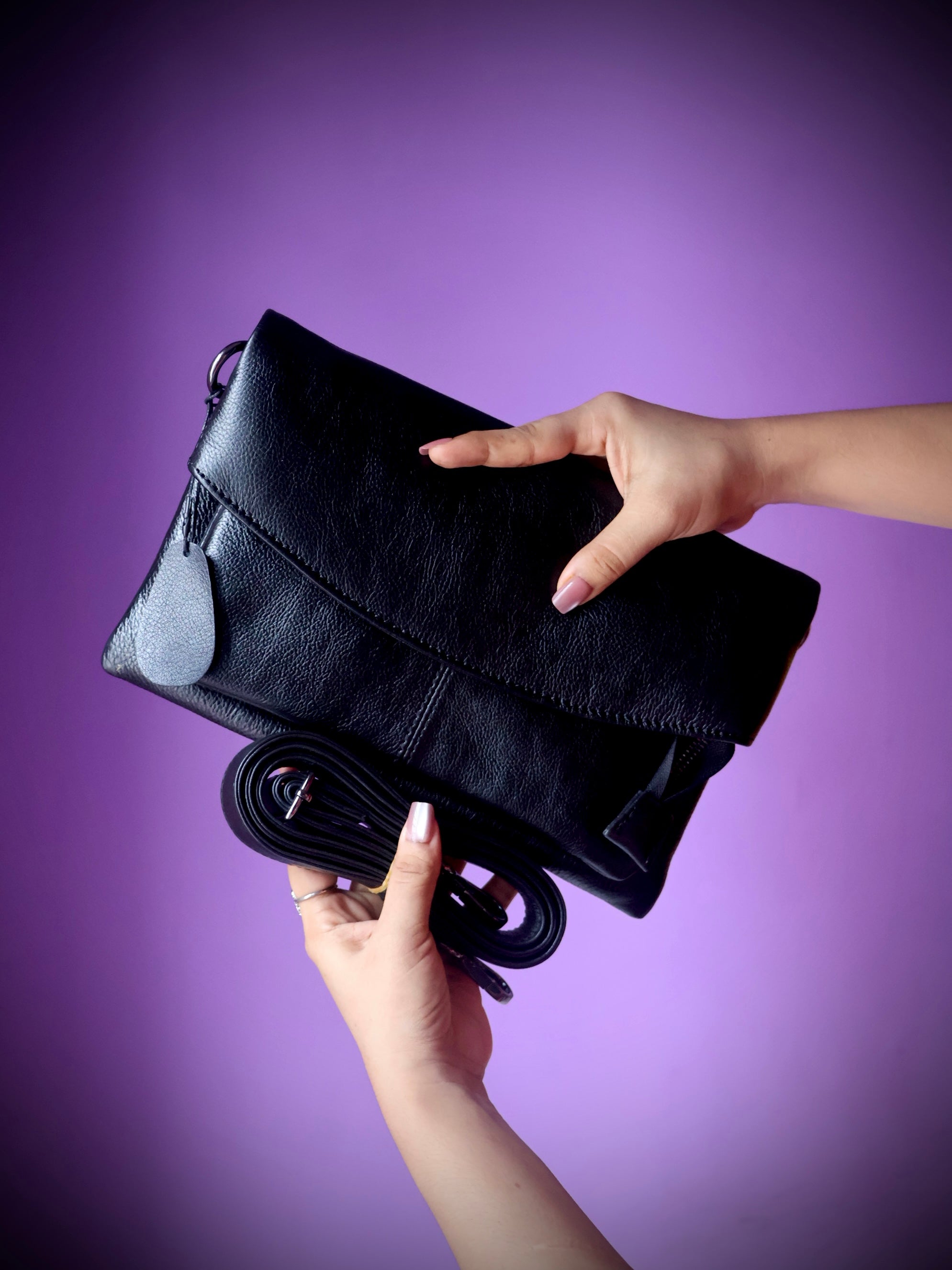 Original leather crossbody clutch bag black - front view with zipper pocket and detachable strap