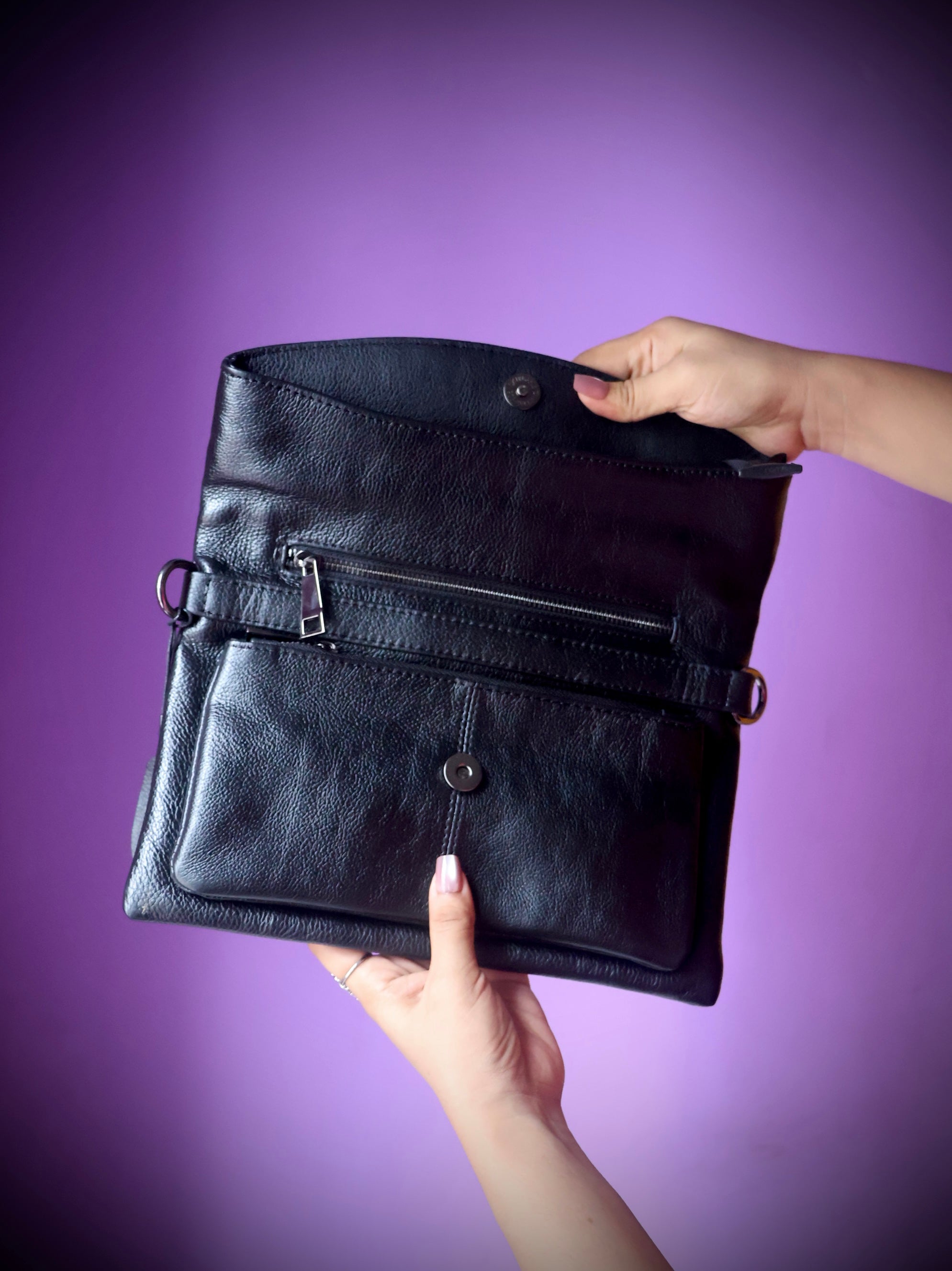 Original leather crossbody clutch bag black - back view showing snap button closure and multiple pockets