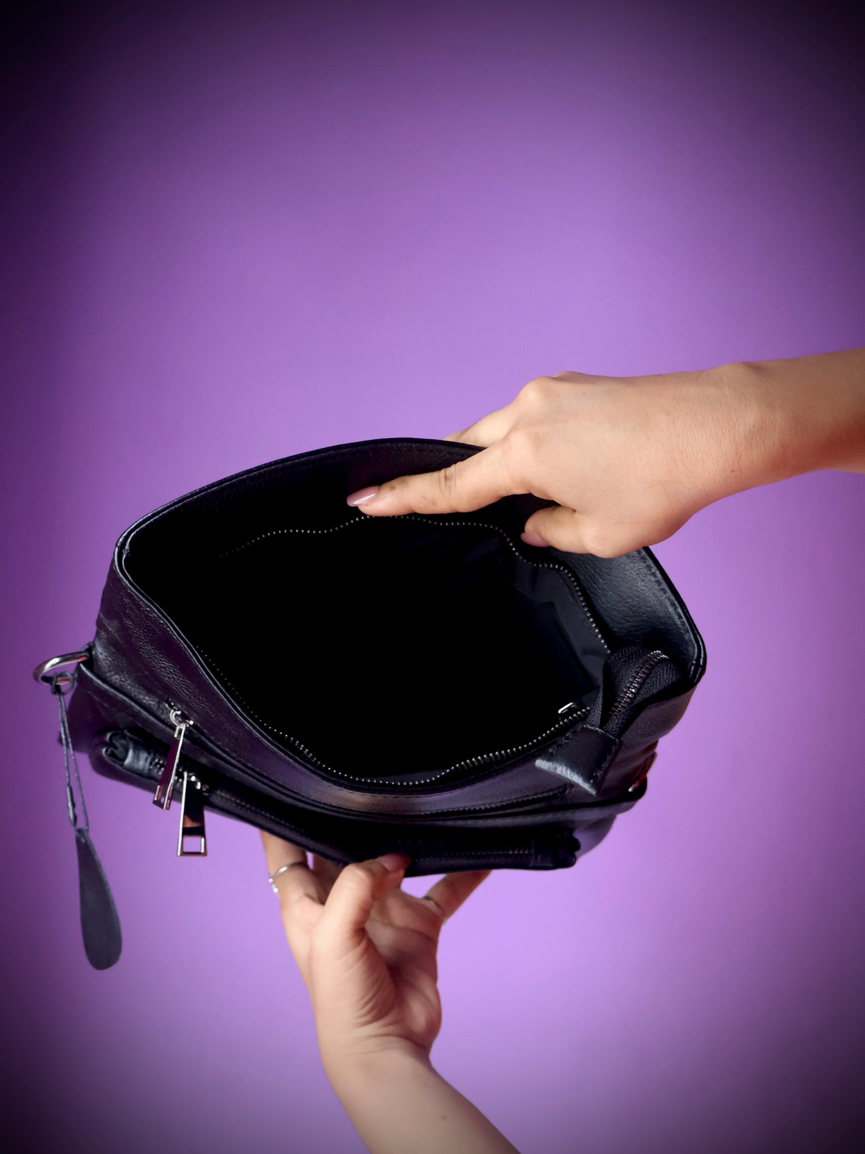 Original leather crossbody clutch bag black - open interior showing spacious main compartment