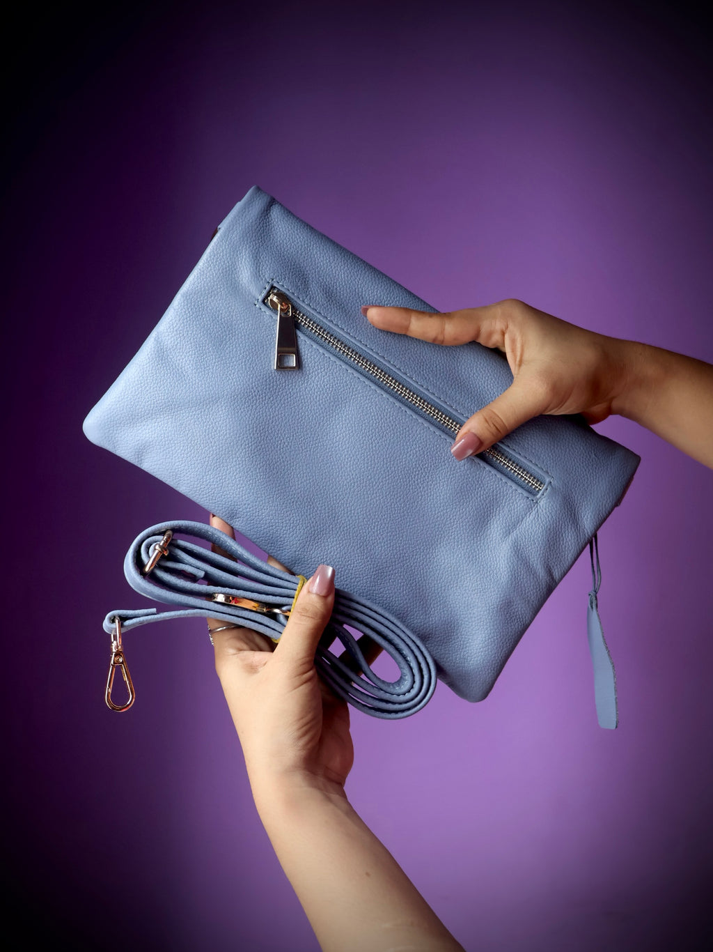 Original leather crossbody clutch bag sky blue - full view with detachable crossbody strap and gold-tone clasp