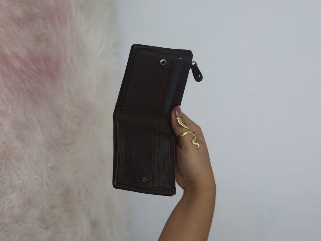 Buffalo black leather bifold wallet held open showing interior