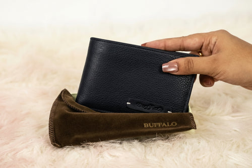 Buffalo leather bifold wallet open showing card slots and coin pocket