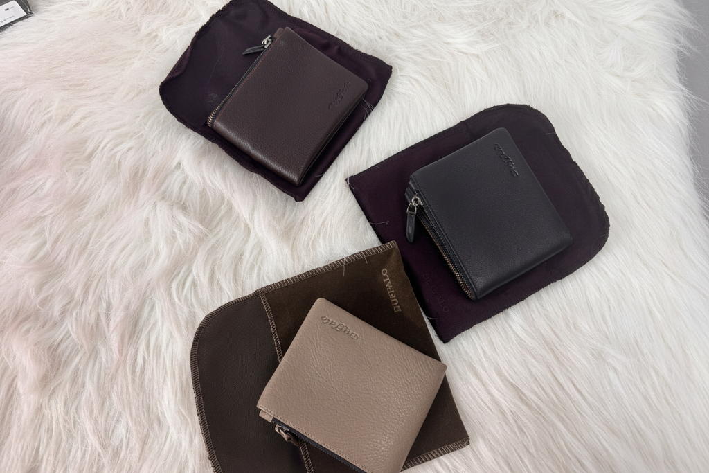 Three Buffalo wallets with suede pouches