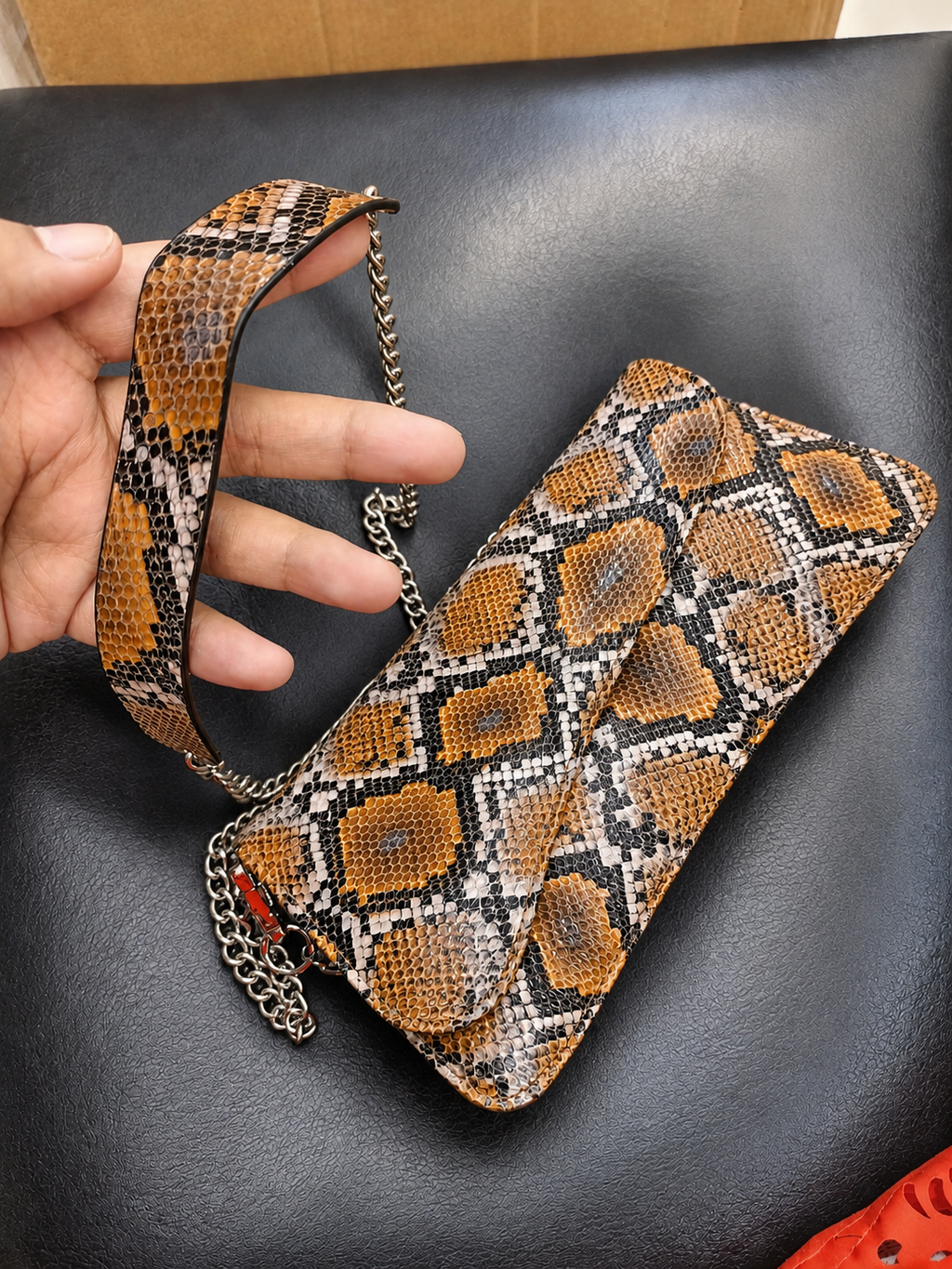 Serpentine Luxe Leather Clutch